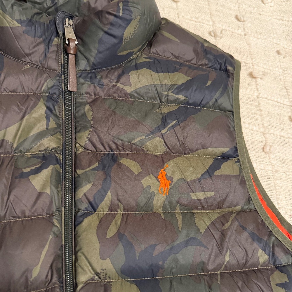 The Polo Ralph Lauren Camo/Orange Puffer Vest is a stylish and practical outerw - Picture 2 of 10